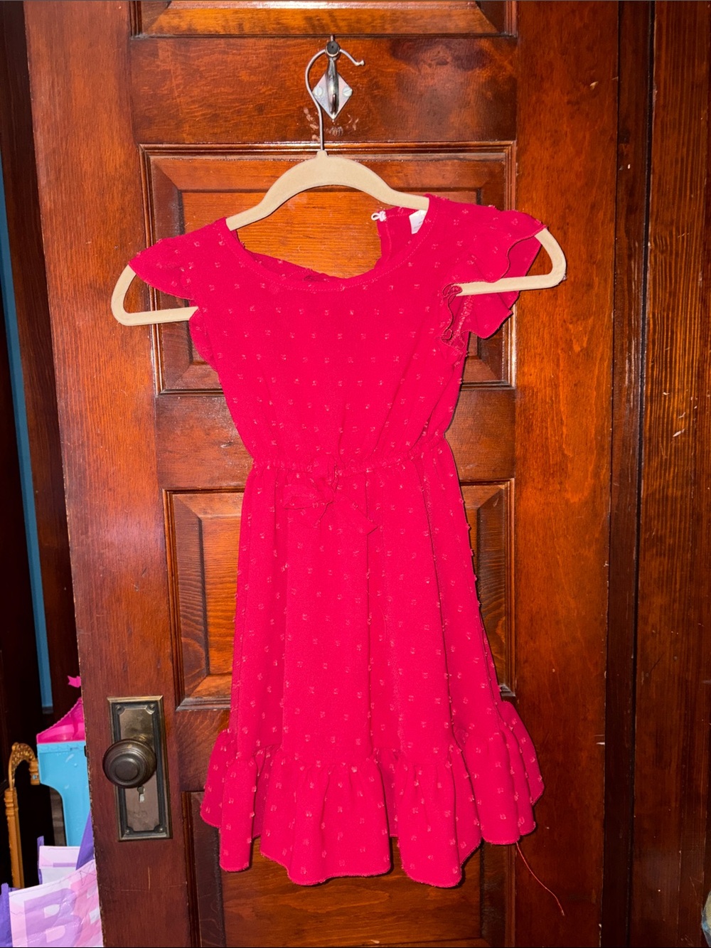 Girl size 6 red dress with bow on front